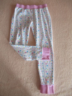 Dívčí pyžamové kalhoty / Domácí tepláky vel. 134 - George