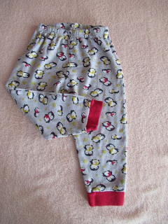 Dívčí pyžamové kalhoty / Domácí tepláky vel. 92-98 - Primark